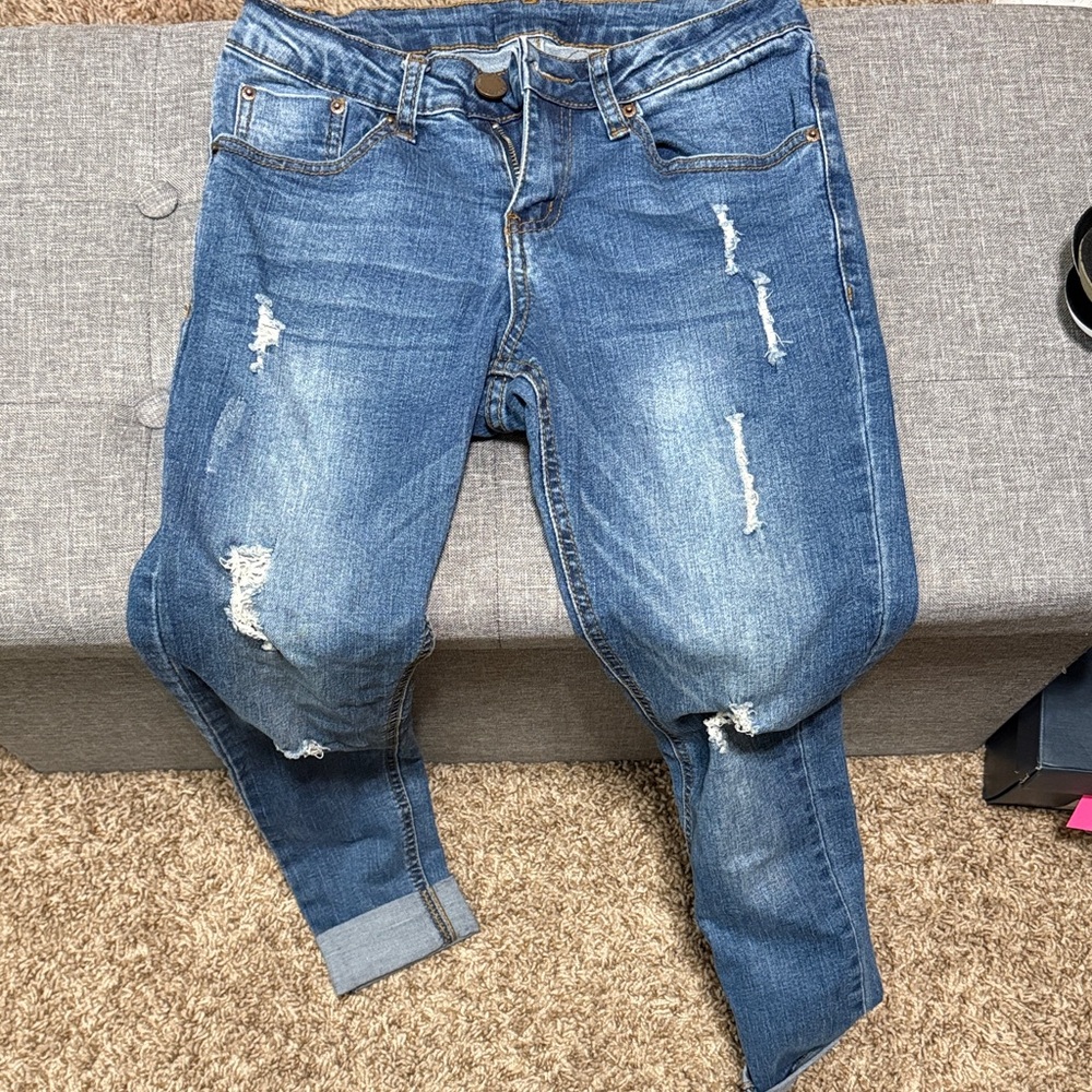 Distressed Blue Jeans